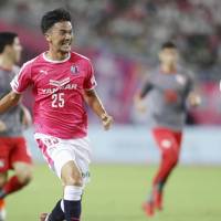 Cerezo Osaka\'s Hirofumi Yamauchi chases the ball during the first half of his team\'s match against Independiente on Wednesday in Osaka. | KYODO