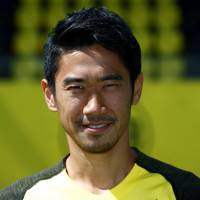 Borussia Dortmund\'s Shinji Kagawa is seen during a team photo session on Aug. 10 in Dortmund, Germany. | REUTERS