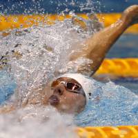 Chase Kalisz of the United States competes in a men\'s 400-meter individual medley preliminary race on Thursday at the Pan Pacific Championships at Tokyo Tatsumi International Swimming Center. Kalisz won the final, beating former world champions Kosuke Hagino and Daiya Seto in the race. | AP