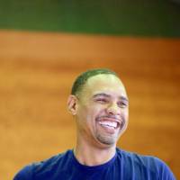 Antonio Lang laughs during a recent basketball clinic in Toyama. | TAKANORI GOYA