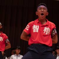 Students lead cheers during a pep rally before the tournament.  | LANCE HENDERSTEIN