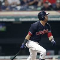 The Indians\' Leonys Martin is seen watching his sacrifice fly in the eighth inning on Aug. 7 in Cleveland. | KYODO