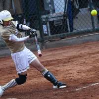 Saki Yamazaki bats during the women\'s softball final between Japan and Taiwan at the Asian Games in Jakarta on Friday. | AFP-JIJI