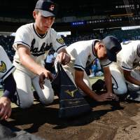 It is a tradition for losing teams to bring Koshien soil home, though it is unclear when it began. | KYODO
