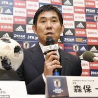 Japan men\'s national team manager Hajime Moriyasu speaks at a news conference on Thursday in Bogor, Indonesia. | KYODO