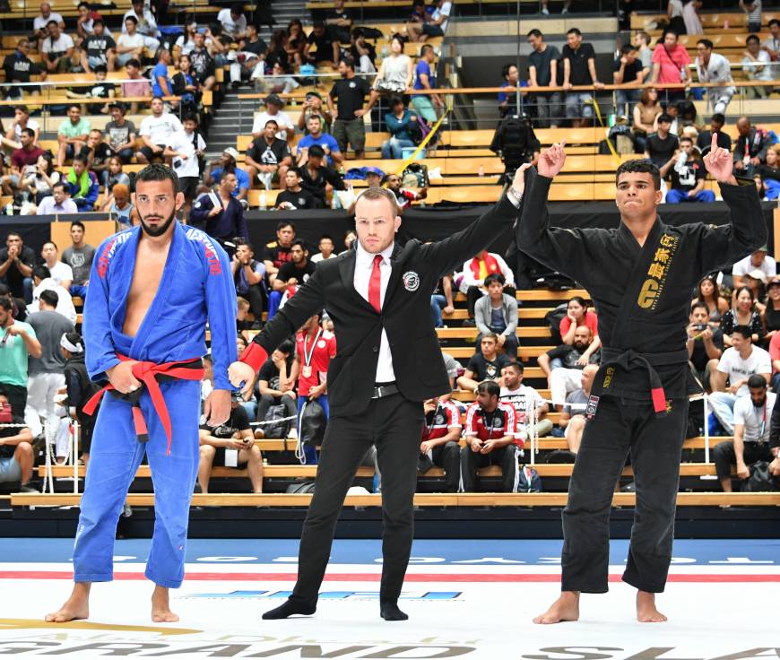 Brazilian Rudson Mateus Sarmento Teles (top), winner of the 94-kg adult black belt category, and Briton Arya Esfandmaz compete at the Abu Dhabi Grand Slam Jiu Jitsu World Tour 2018 at Ota Gymnasium on July 29. The tournament consists of five major events held in Los Angeles, Tokyo, Rio de Janeiro, Abu Dhabi, London and Moscow. The tour is organized by the UAE Jiu Jitsu Federation and the UAE Embassy.
