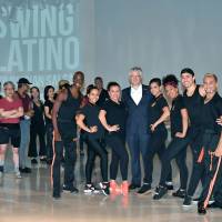 Colombian Ambassador Gabriel Duque (fifth from right) poses for a photo with the Colombian salsa dance company Swing Latino at a salsa workshop that was held at the Star Rise Tower in Tokyo on July 31. | YOSHIAKI MIURA