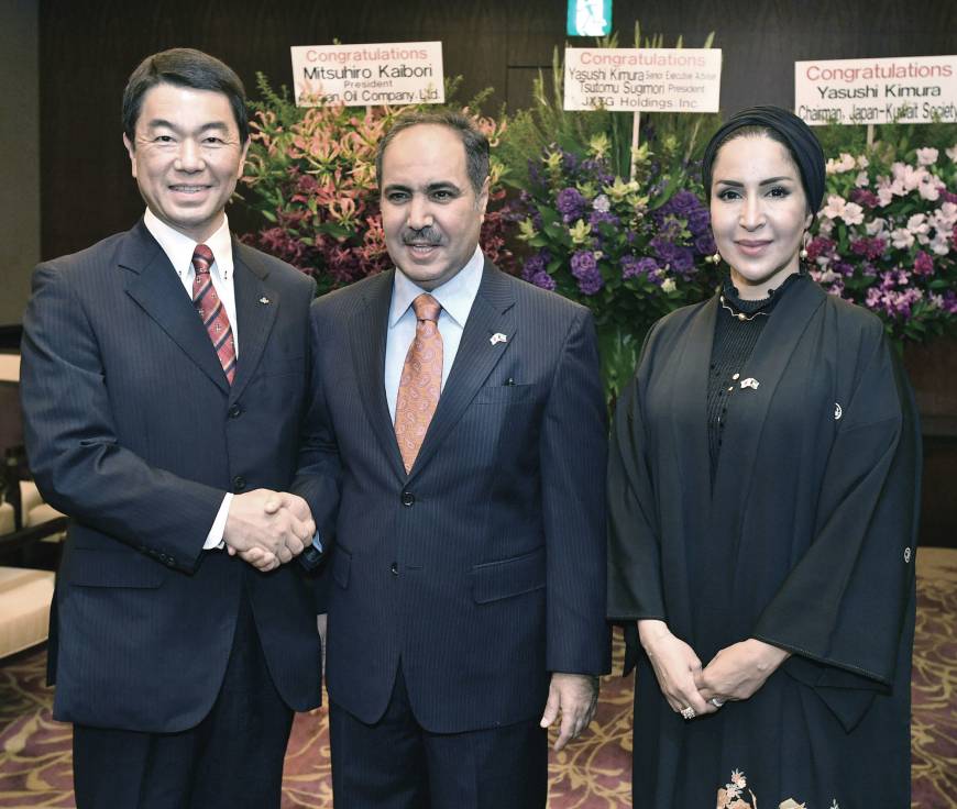 Kuwaiti Ambassador Abdul Rahman Humood Al-Otaibi (center) and his wife, Jamila, pose for a photo with Miyagi Gov. Yoshihiro Murai at a reception on Aug. 9 to celebrate      the completion of the ambassador