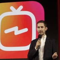 Kevin Systrom, CEO and co-founder of Instagram, attends a news conference in June in San Francisco. | AP