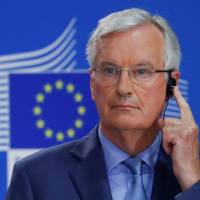 The European Union\'s chief Brexit negotiator Michel Barnier listens to a translation during a news conference in Brussels in July. | REUTERS