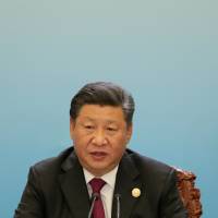 Chinese President Xi Jinping, seen on Sept. 4 during the 2018 Beijing Summit of the Forum on China-Africa Cooperation, has overseen tightened restrictions on religions seen as a challenge to the authority of the ruling Communist Party. | REUTERS