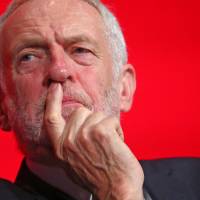 Britain\'s Labour Party leader Jeremy Corbyn is seen at the party\'s annual conference in Liverpool, England, on Sunday. | REUTERS