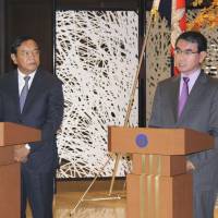 Foreign Minister Taro Kono (right) speaks to the media at a joint news conference with his Cambodian counterpart Prak Sokhonn on Wednesday in Tokyo. | KYODO