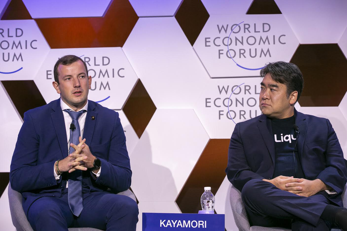 Mike Kayamori (right), CEO of Quoine Pte. Ltd., a Tokyo-based firm that runs a bitcoin exchange, attends a session on cryptocurrency as a panelist during the World Economic Forum's Annual Meeting of the New Champions on Sept. 18 in Tianjin, China. | WORLD ECONOMIC FORUM