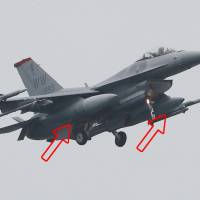 Arrows point to the fuel tanks of an F-16 fighter jet from U.S. Misawa Air Base in this August 2017 photo. Local fishermen in Aomori Prefecture have decided to seek about &#165;93 million in damages over the dumping of fuel tanks by an F-16 from the base in February of this year. | KYODO