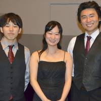 The members of the Aoi Trio, the first piano trio from Japan to win first prize in the prestigious ARD International Music Competition, are seen in Munich on Saturday. From left: cellist Yu Ito, violinist Kyoko Ogawa and pianist Kosuke Akimoto. | KYODO