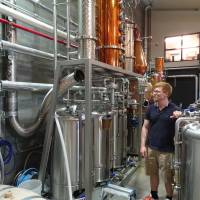 Alex Davies, head distiller of Kyoto Distillery, inspects his work in August. | ERIC JOHNSTON