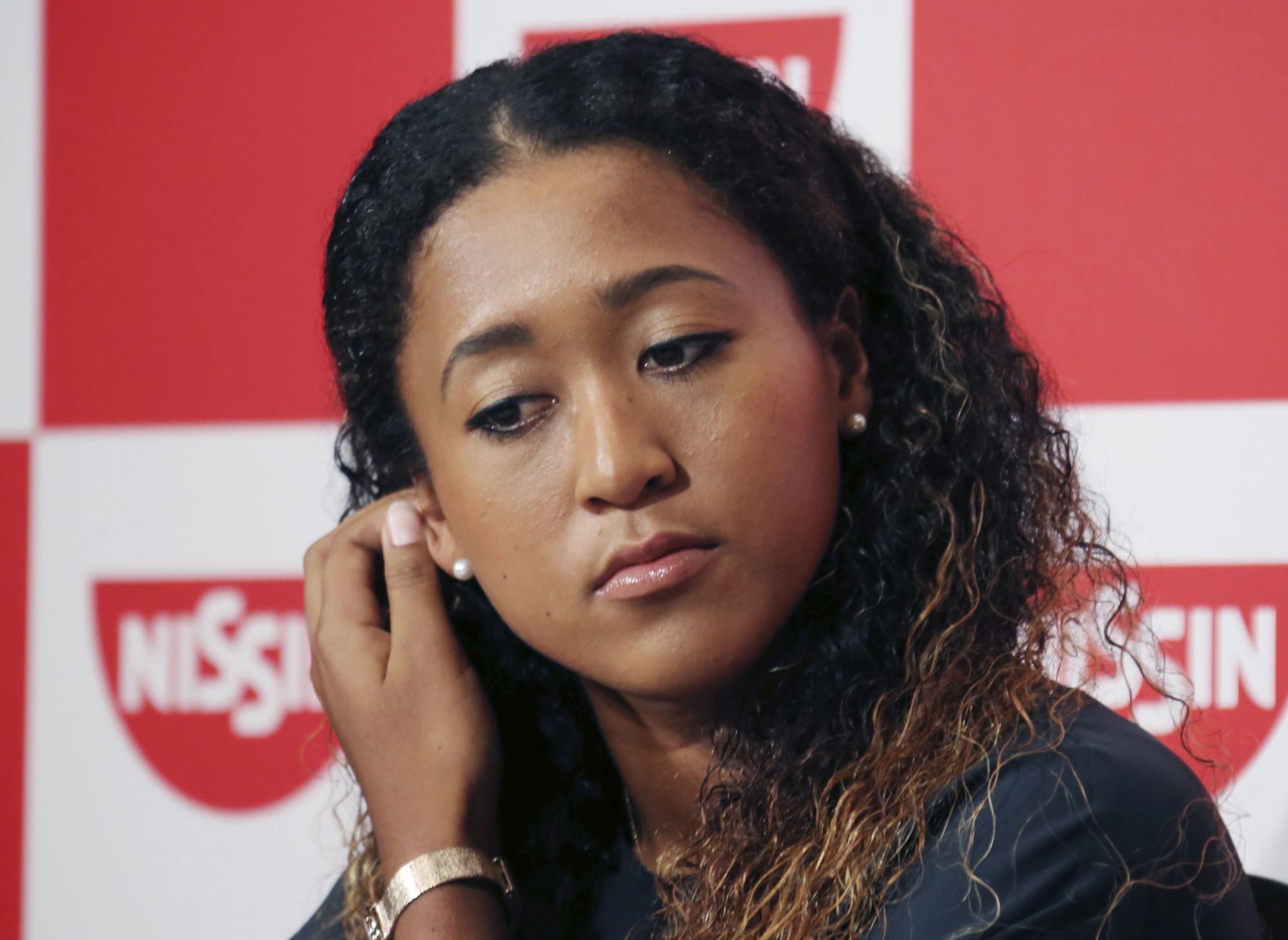 Double trouble: Given the present 'don't ask, don't tell' attitude of the Justice Ministry, it would be highly unusual if Naomi Osaka was forced to relinquish her U.S. citizenship at the age of 22. | AP