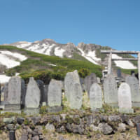 Sacred ground: A torii gate and stone monuments halfway up the mountain. | TOM FAY