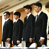 National basketball team players (from left) Yuya Nagayoshi, Takuya Hashimoto, Takuma Sato and Keita Imamura, along with Japan Basketball Association Chairperson Yuko Mitsuya, face reporters in August. | AFP-JIJI