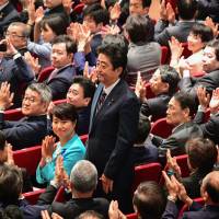 Prime Minister Shinzo Abe, shown after winning the LDP leadership election on Sept. 20, should focus his efforts on deepening and solidifying Japan\'s economic resurgence. | AFP-JIJI