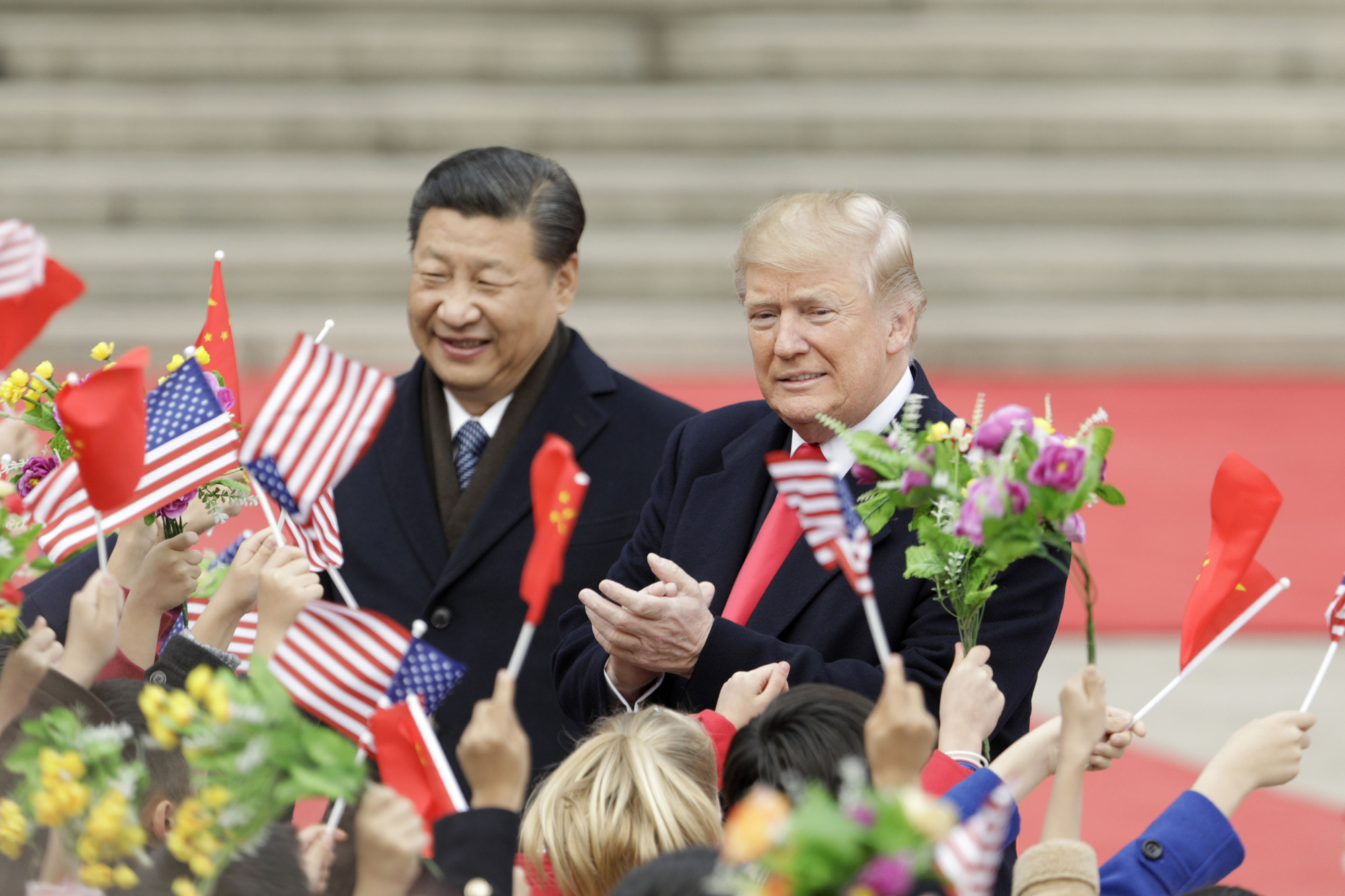 U.S. President Donald Trump and Chinese President Xi Jinping attend a welcome ceremony in Beijing last November. In the 1990s and early 2000s, it was widely assumed Beijing would eventually liberalize economically and politically. Now, that rosy scenario has largely been abandoned. | BLOOMBERG