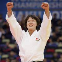 Chizuru Arai reacts after defending her title in the women\'s 70-kg division at the world championships with a victory over France\'s Marie Eve Gahie in Baku on Monday. | KYODO