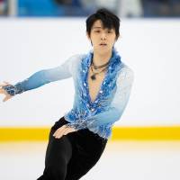 Two-time Olympic champion Yuzuru Hanyu competes in the short program at the Autumn Classic event in Oakville, Ontario, on Friday. | AFP-JIJI