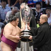 The 30-kg Emperor\'s Cup is awarded to the winner of each sumo tournament. | KYODO