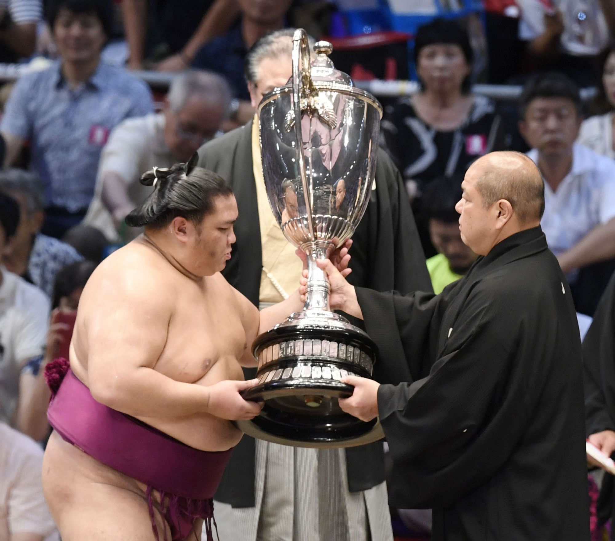 The 30-kg Emperor's Cup is awarded to the winner of each sumo tournament. | KYODO