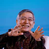 Bank of Japan Gov. Haruhiko Kuroda speaks during a seminar at the International Monetary Fund &#8212; World Bank Group Annual Meeting 2018 in Nusa Dua, Bali, Indonesia, Oct. 13. | REUTERS