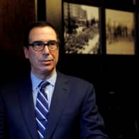 U.S. Treasury Secretary Steven Mnuchin speaks during his interview with Reuters in Jerusalem Sunday. | REUTERS