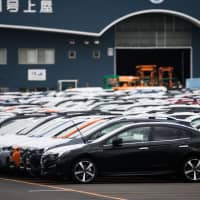 Analysts think the possibility of higher U.S. tariffs on Japanese car exports has eased, according to a recent survey. | BLOOMBERG