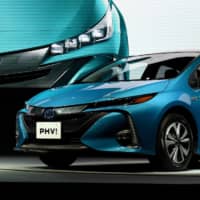A Toyota Prius plug-in hybrid is shown to the media at a news conference in February 2017. Toyota Motor Corp. said Friday it is recalling more than 2.4 million hybrid cars. | AFP-JIJI