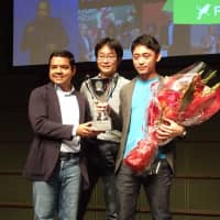 Fenox Venture Capital CEO Anis Uzzaman (from left), Jeplan Inc CEO Masaki Takao and Senior Manager Hiroki Sugiyama pose for photos during the Japan round of Startup World Cup 2019 last Friday in Tokyo. | KAZUAKI NAGATA