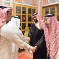 Saudi King Salman bin Abdulaziz Al Saud (right) and Saudi Crown Prince Mohammed bin Salman (second, right) receive the family of Jamal Khashoggi in Riyadh Tuesday. | BANDAR ALGALOUD / COURTESY OF SAUDI ROYAL COURT / HANDOUT / VIA REUTERS