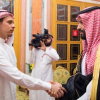 Saudi Crown Prince Mohammed bin Salman meets Salah Khashoggi, the son of murdered Washington Post columnist Jamal Khashoggi, in Riyadh on Tuesday. | REUTERS