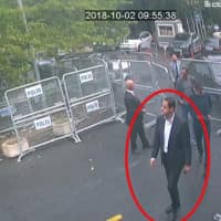 In a frame from surveillance camera footage taken Oct. 2 and published Thursday by the pro-government Turkish newspaper Sabah, a man identified by Turkish officials as Maher Abdulaziz Mutreb, walks toward the Saudi Consulate in Istanbul before writer Jamal Khashoggi disappeared. Saudi Arabia, which initially called the allegations \"baseless,\" has not responded to repeated requests for comment from The Associated Press over recent days, including on Thursday over Mutreb\'s identification. | SABAH / VIA AP