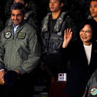 Taiwanese President Tsai Ing-wen (right) and Paraguay leader Mario Abdo Benitez attend an anti-invasion drill, simulating the China\'s People\'s Liberation Army (PLA) invading the island, in Taoyuan, Taiwan, on Oct. 9. | REUTERS