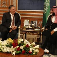 U.S. Secretary of State Mike Pompeo meets with the Saudi Crown Prince Mohammed bin Salman in Riyadh Tuesday. Pompeo also met on Tuesday with Saudi King Salman over the disappearance and alleged slaying of Saudi writer Jamal Khashoggi, who vanished two weeks ago during a visit to the Saudi Consulate in Istanbul. | LEAH MILLIS / POOL / VIA AP