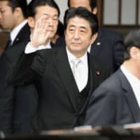 Prime Minister Shinzo Abe after he visited the Yasukuni Shrine in December 2013 in Tokyo. | KYODO