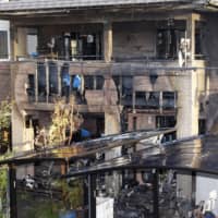 Six people, possibly all from the same family, died after a fire broke out at this residence in Sendai early Thursday morning. | KYODO