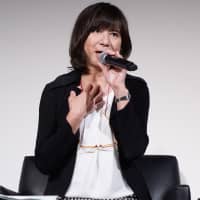 Rin Okabe, a transgender woman working at an ad agency, speaks on LGBT issues at a symposium held on Oct. 11 at the Tokyo Midtown Hibiya complex. | MAGDALENA OSUMI