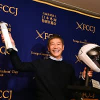 Zozo Inc. CEO Yusaku Maezawa, who is scheduled to travel to space in 2023, poses during a news conference in Tokyo on Tuesday. | YOSHIAKI MIURA