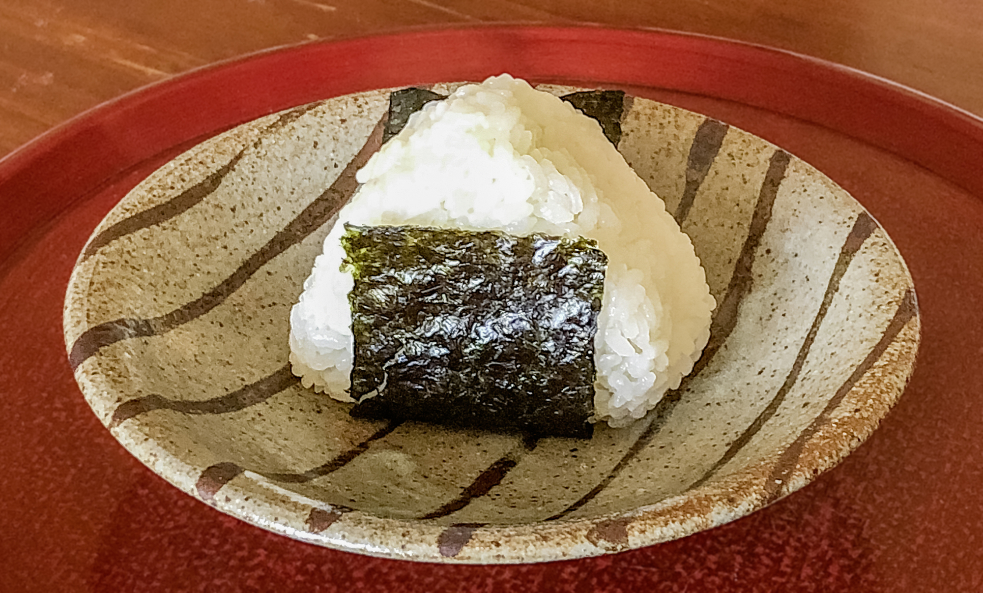 New-harvest rice at its best: A shio musubi (salted rice ball) made with shinmai rice.