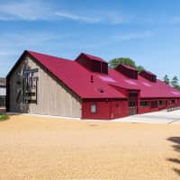 Striking and contemporary: The Dojima Sake Brewery is located in the grounds of Fordham Abbey about an hour outside of London, U.K. The windows on the west wall are aligned to create the kanji for sake. | COURTESY OF DOJIMA SAKE BREWERY