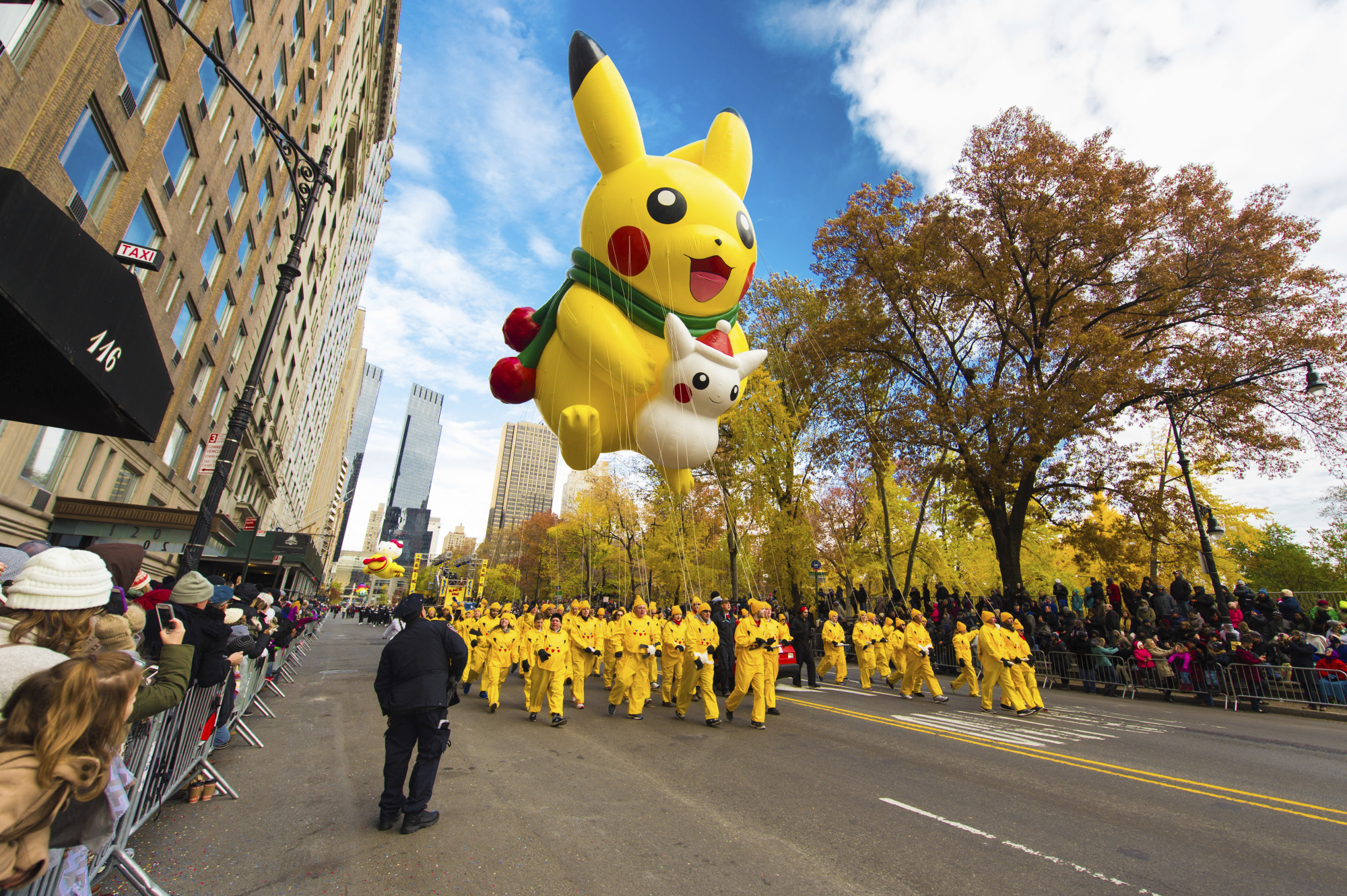 Flying high: A Pikachu balloon floats above the Macy’s Thanksgiving Day Parade in New York in November 2016. | AP