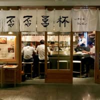 Clean, calm and smoke free: Looking through to the welcoming interior and open kitchen of Iyaiya Sanbai. | ROBBIE SWINNERTON