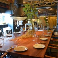 Communal affair: The centerpiece of Maker, a 10-seater table made from a single piece of zelkova wood. | J.J. O\'DONOGHUE