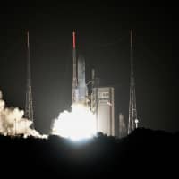 Off  to hotter climes: A rocket carrying two robotic probes is launched from the Kourou space center in French Guiana on Oct. 19 on its seven-year journey to Mercury. | KYODO